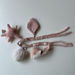 Light pink sea creatures pram tensioner