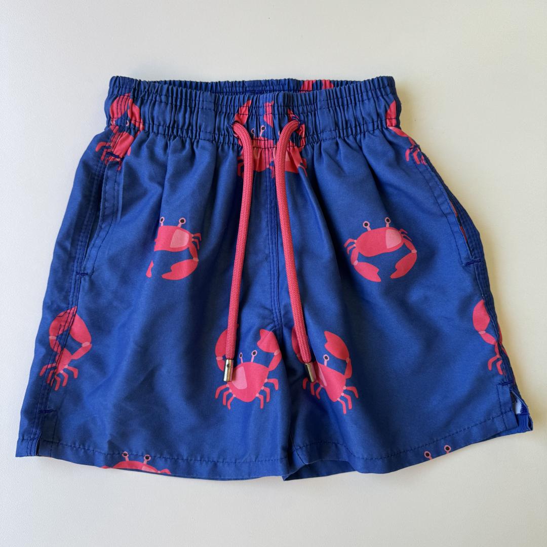 Royal blue swim shorts with pink crabs